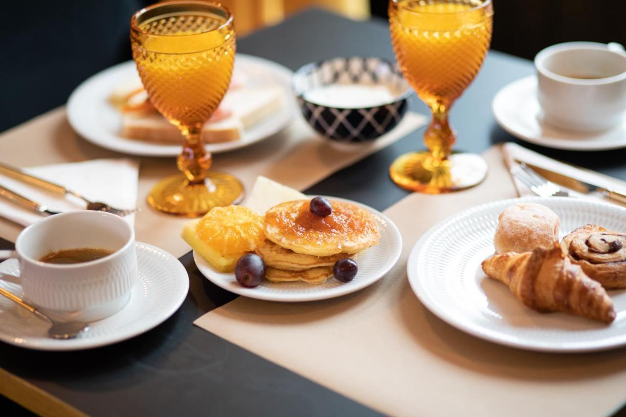 Hotel Republica Boutique Hotel Tomar Eksteriør billede A typical breakfast in Paris